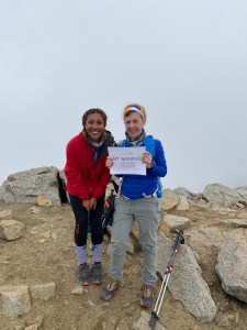 At the top of Mt. Massive with my mom and our Team Brooks sign. 
